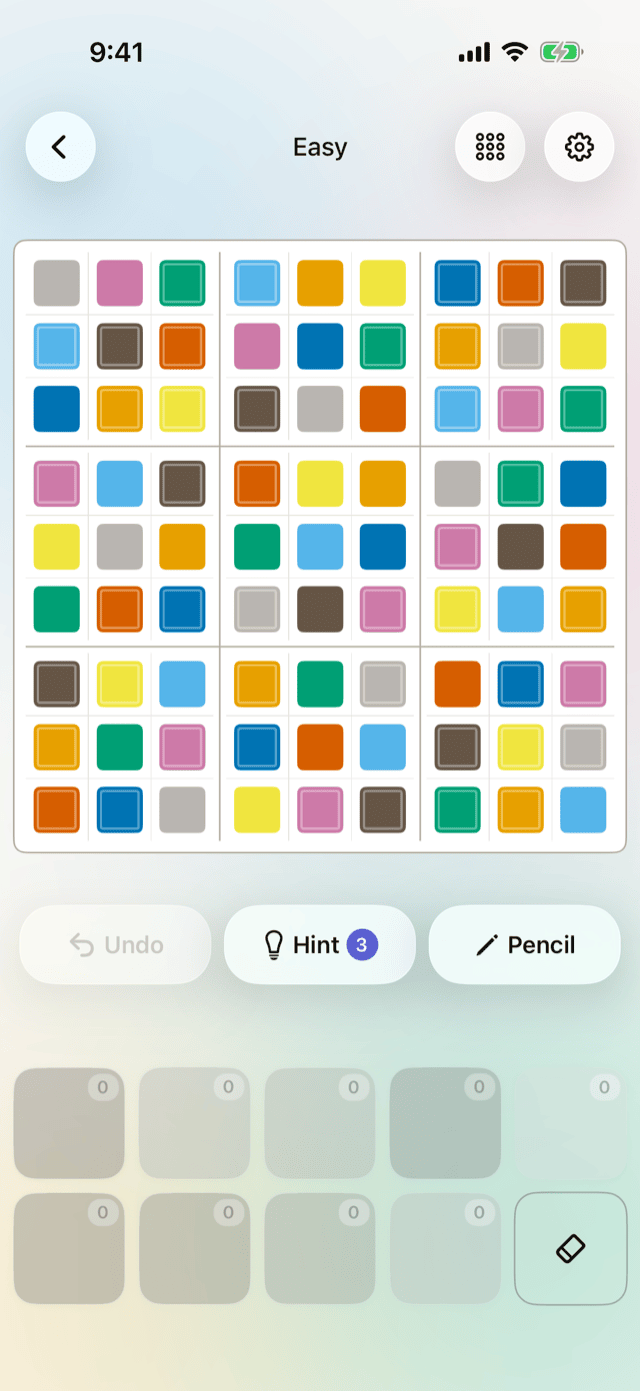 A fully solved Aikui board, every cell filled with color.